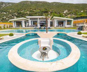 Villa Green House Kalkan Sarıbelen'de Korunaklı Havuzlu Kiralık Villa